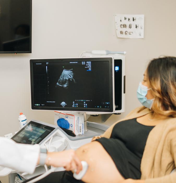 Pregnant woman receiving an ultrasound